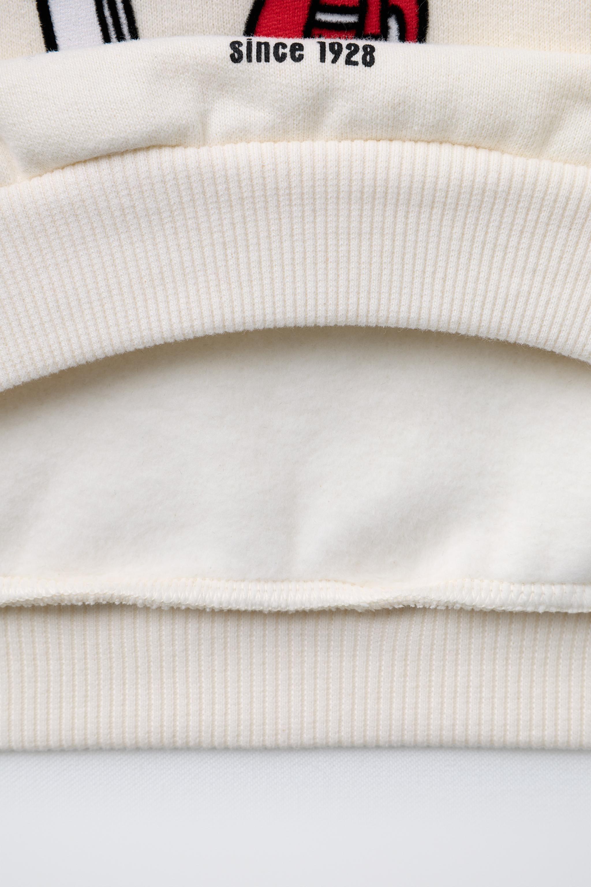 MICKEY MOUSE © DISNEY POCKET SWEATSHIRT